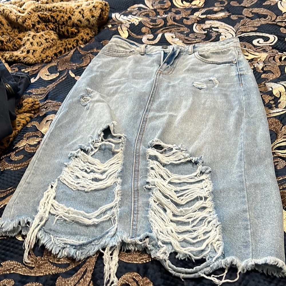 Jeans skirt with cutoffs at front bottom